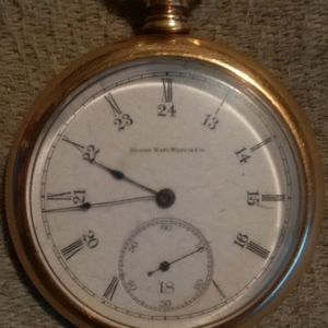 An Elgin pocket watch in a cashier case1896